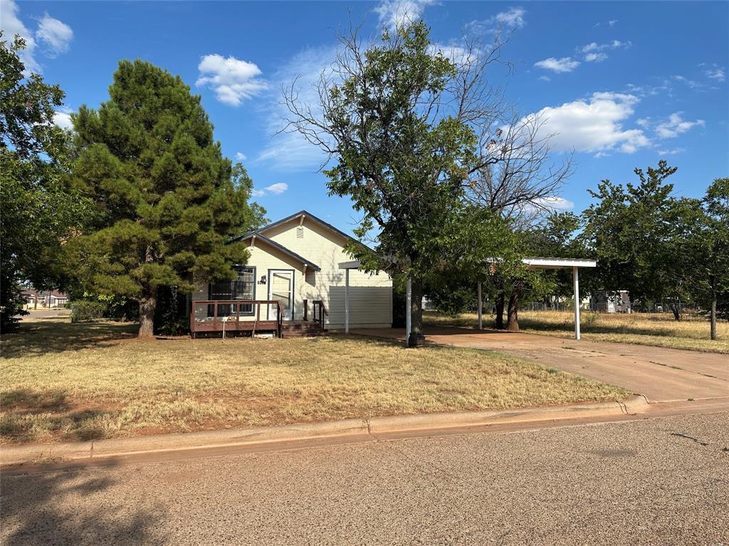 a house with trees in the background