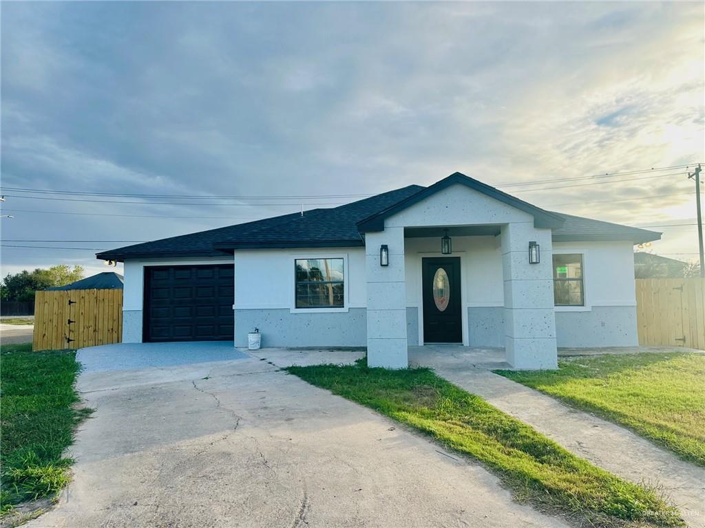 Stucco house with a garage