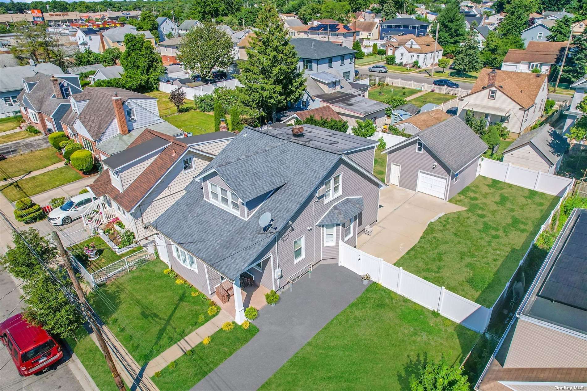 an aerial view of a house with a garden