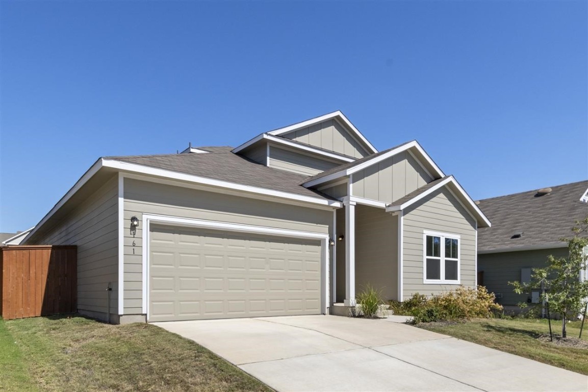 a front view of house with yard