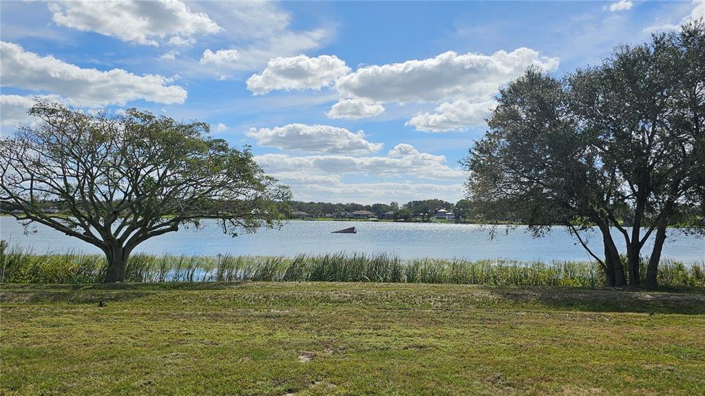 a view of lake with outdoor space