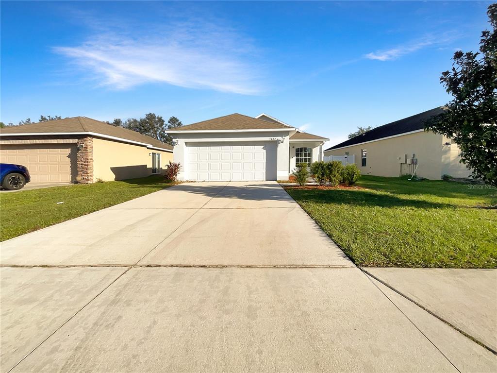 a view of house with outdoor space