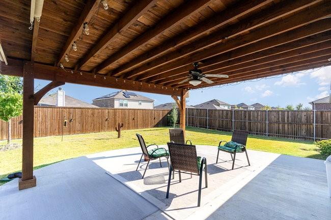 a view of a swimming pool with a patio