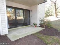 a view of a glass door with a yard