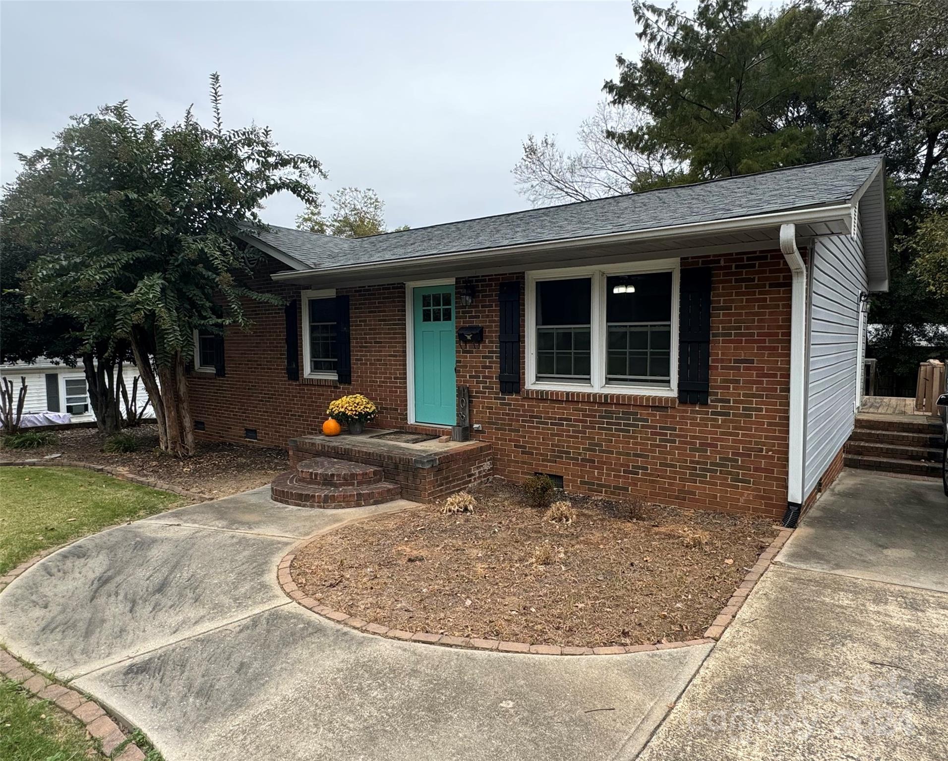 a view of a house with a patio