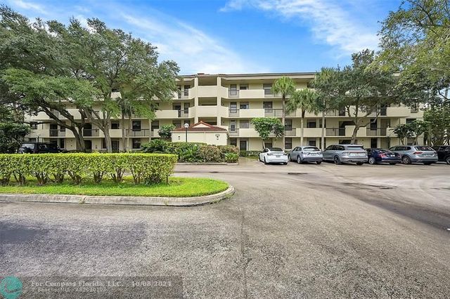 $249,900 | 2908 Carambola Circle South, Unit 403 | Applewood Village IV