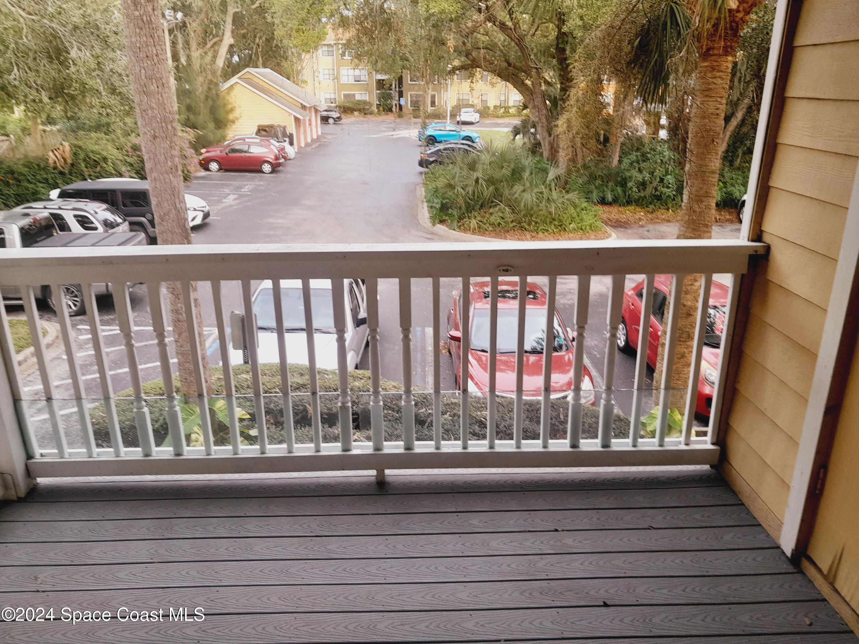 a view of a balcony with outdoor space