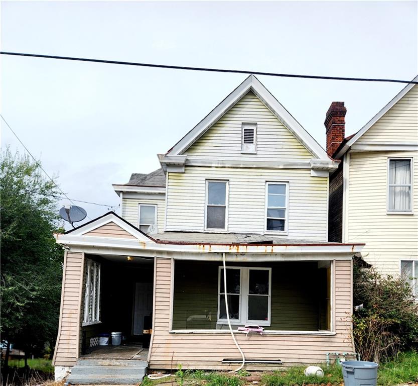 a front view of a house with a garage