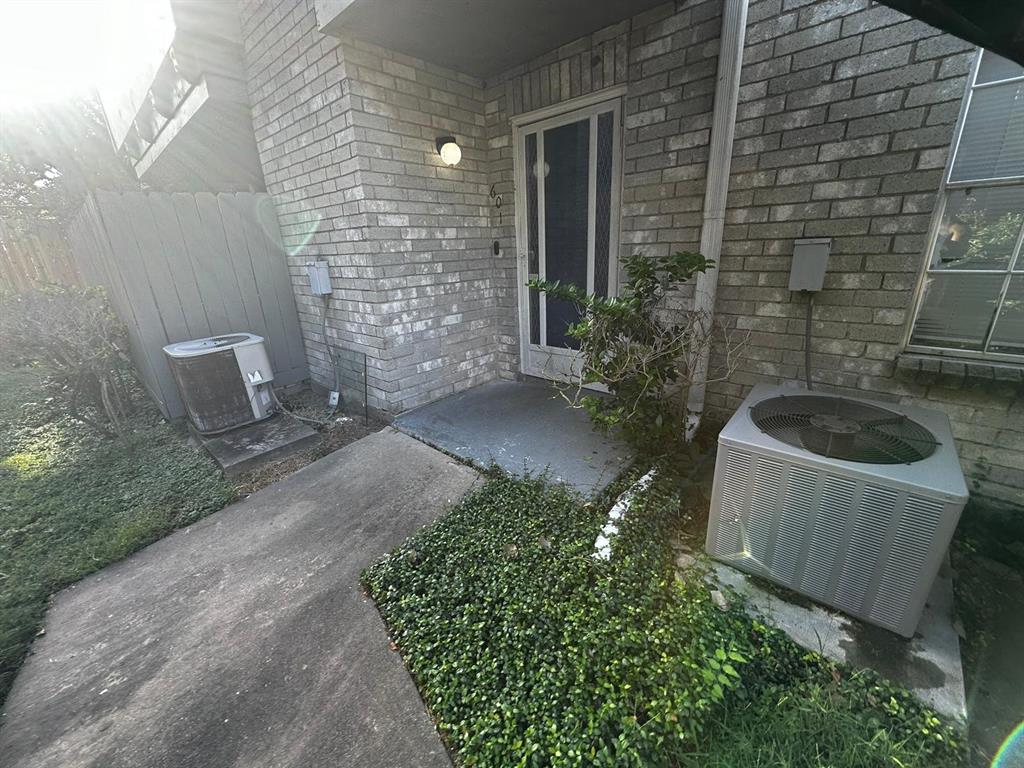 a view of a sink and toilet in the back yard