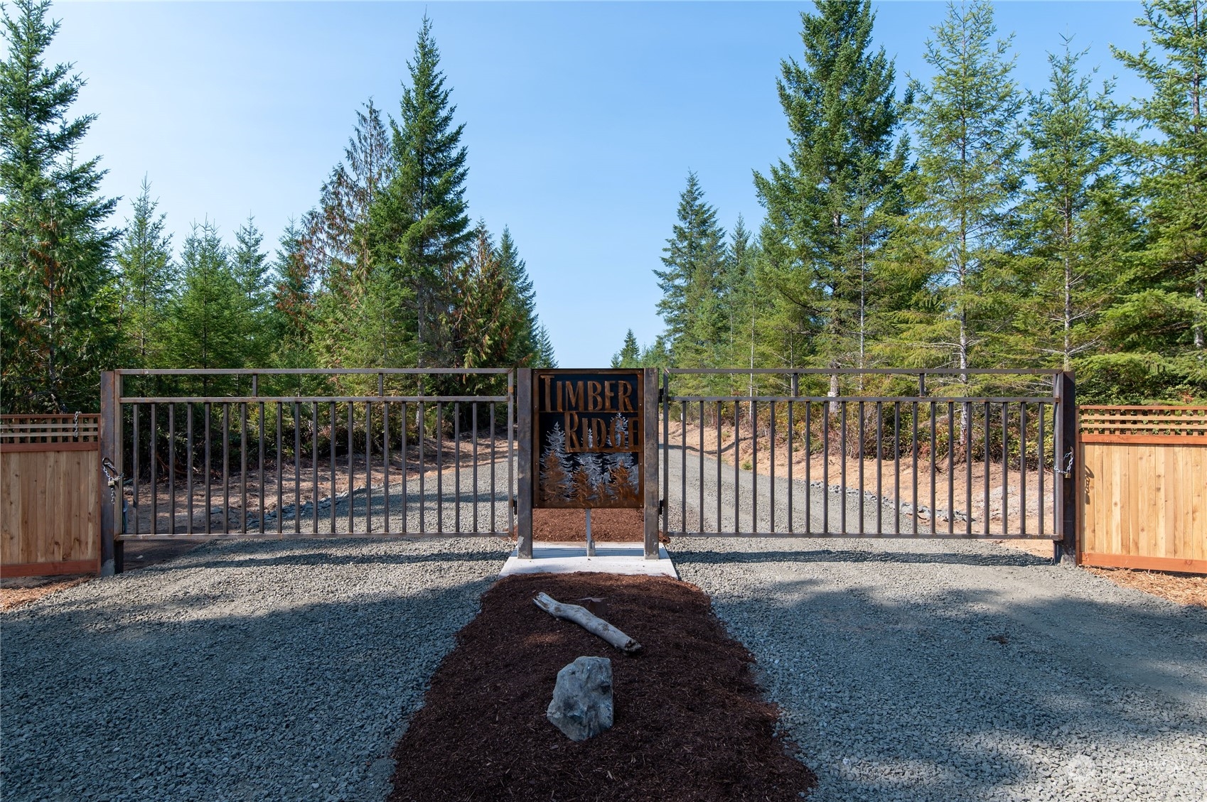 a yard with wooden fence