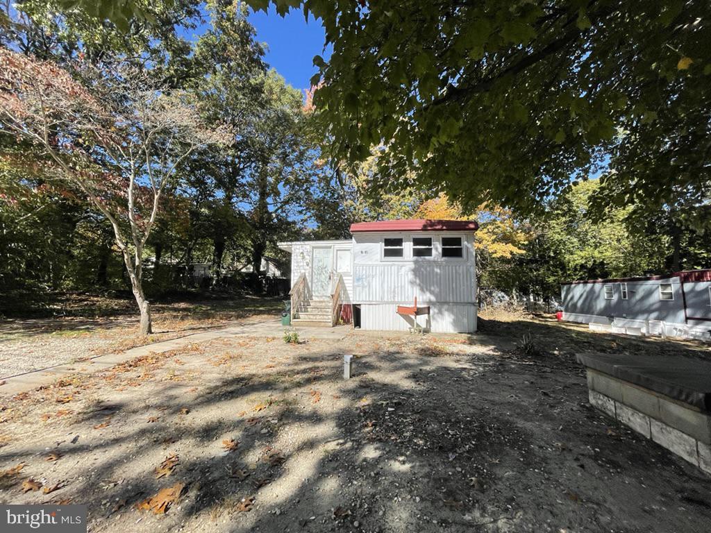 a house with a tree in front of it