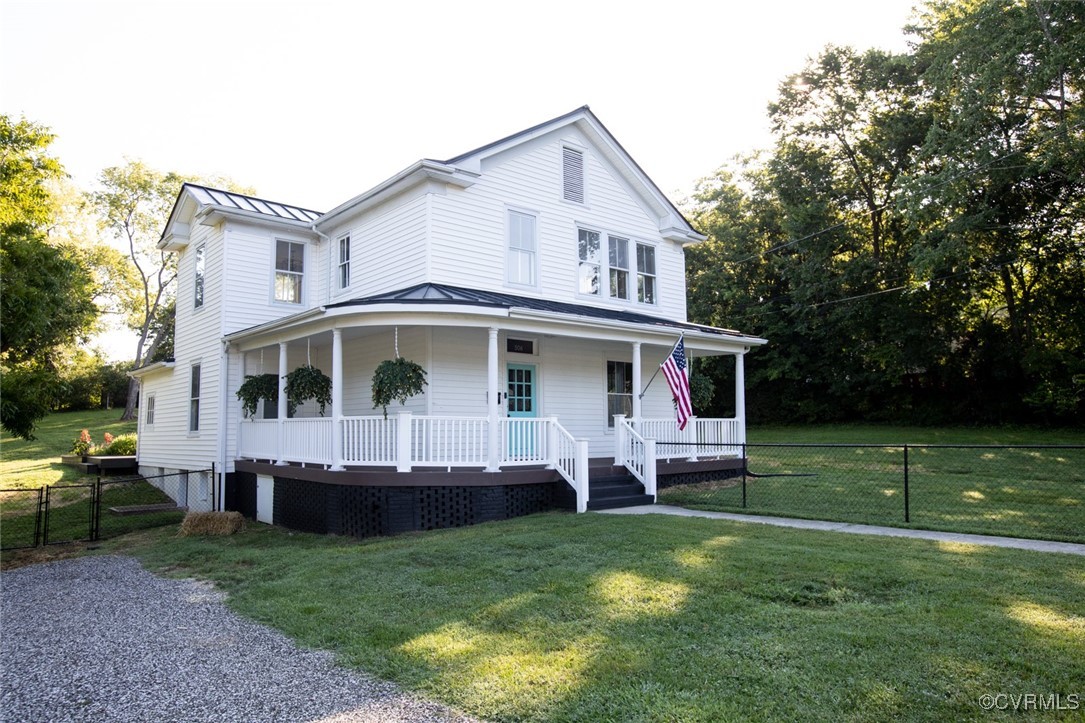 a front view of house with garden