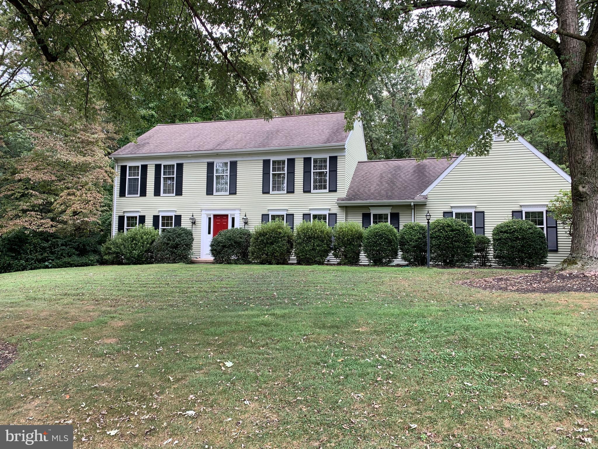 a house with garden in front of it