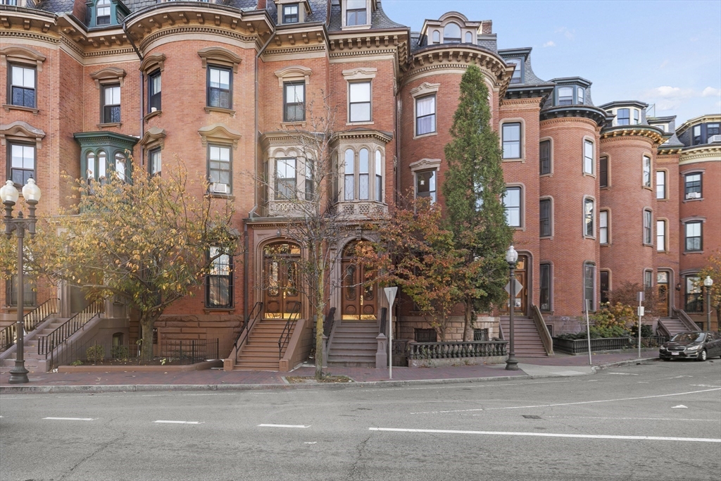 a front view of a multi story residential apartment building