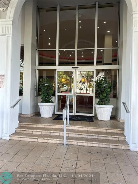 a view of a entryway door front of house