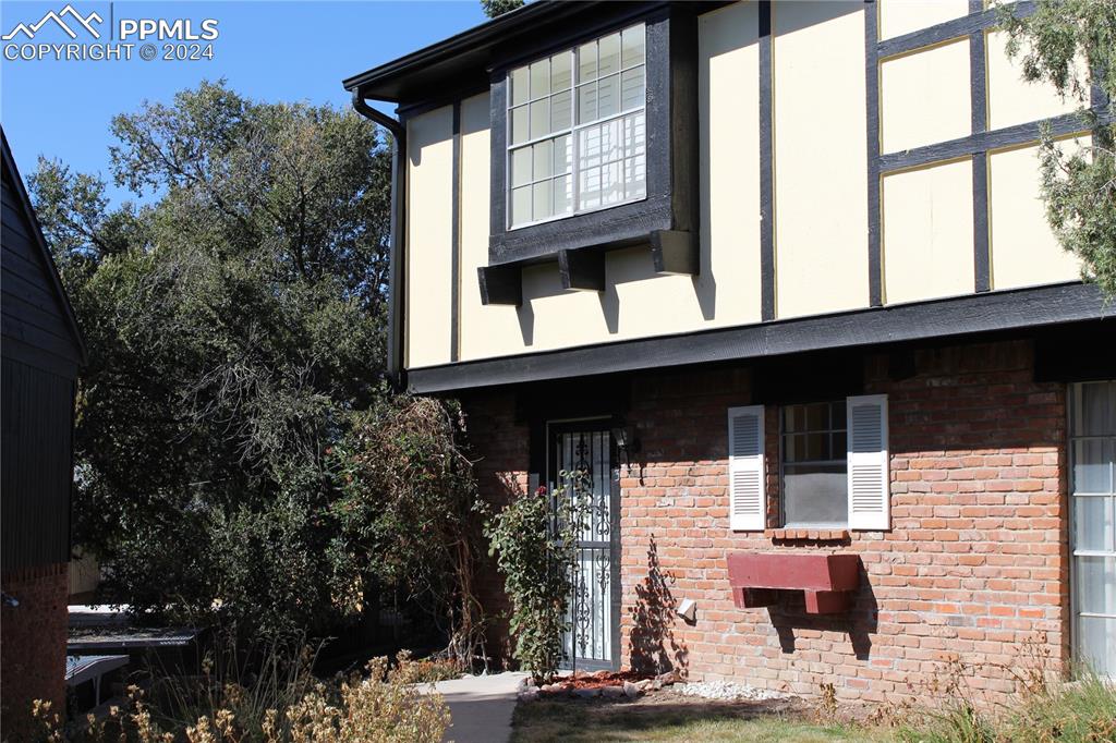 a front view of house with street view