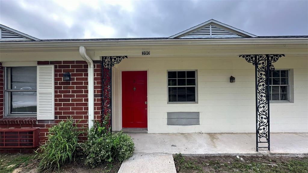 a front view of a house with garage