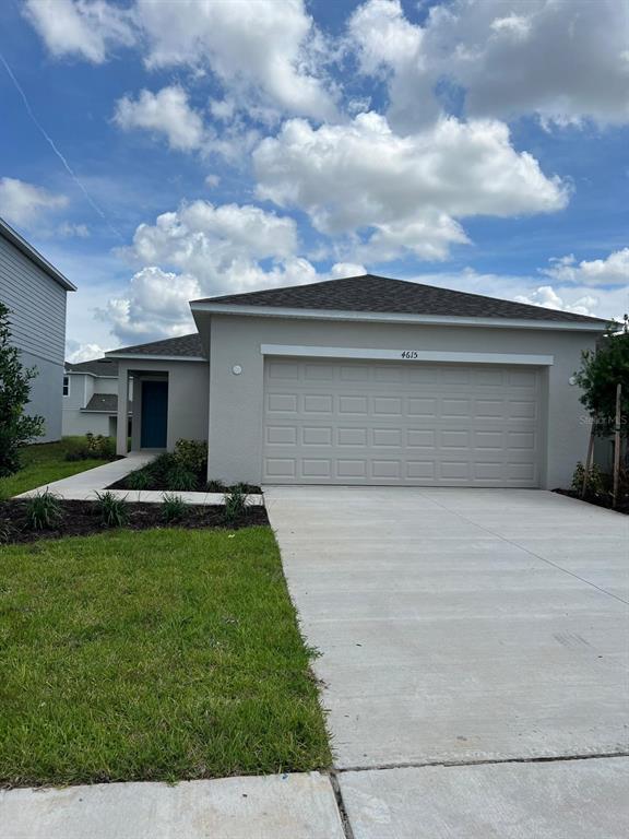 a front view of house with yard