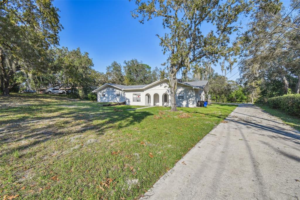 a view of a house with a big yard