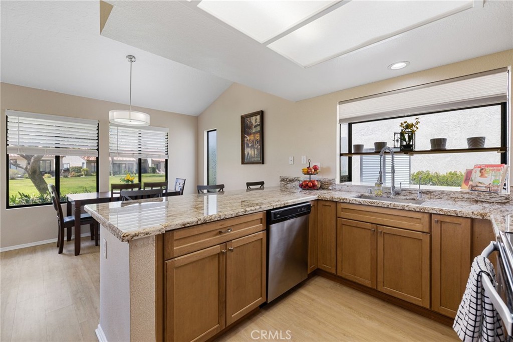 a kitchen with center island and sink