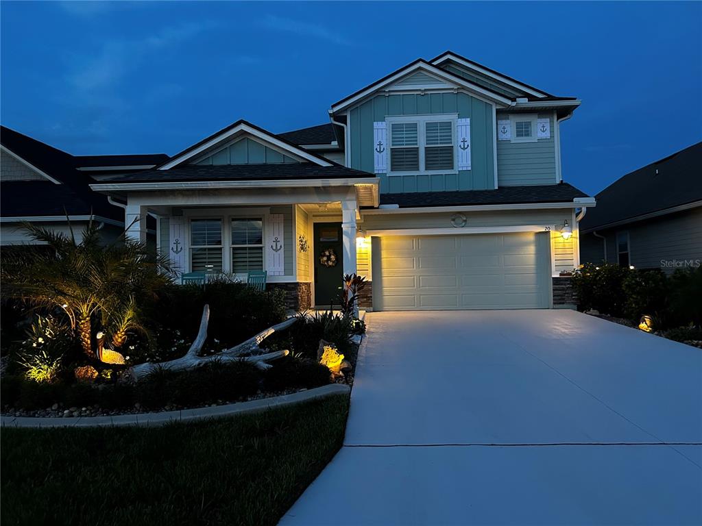 a front view of a house with yard