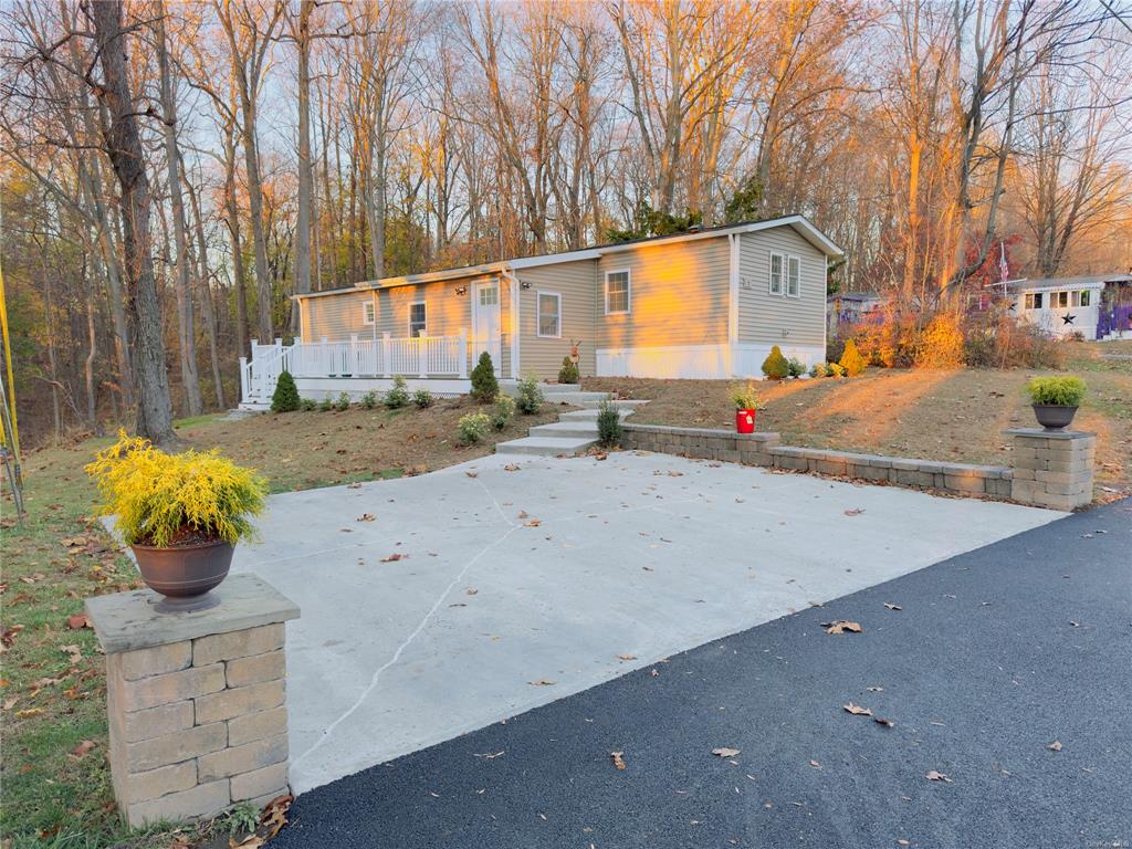 a view of a back yard of the house