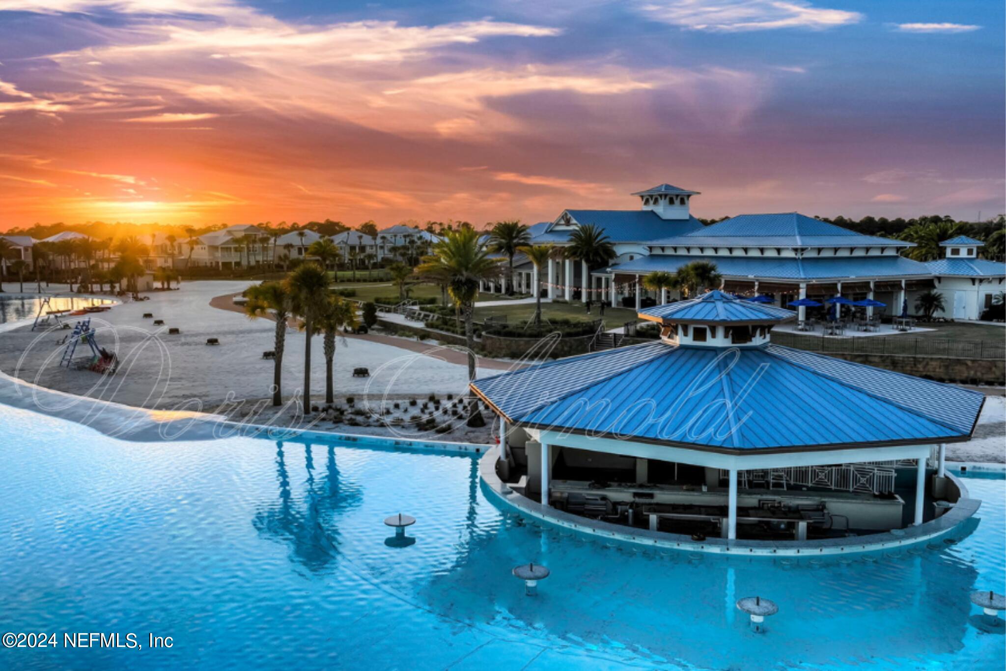 a view of a swimming pool with a patio