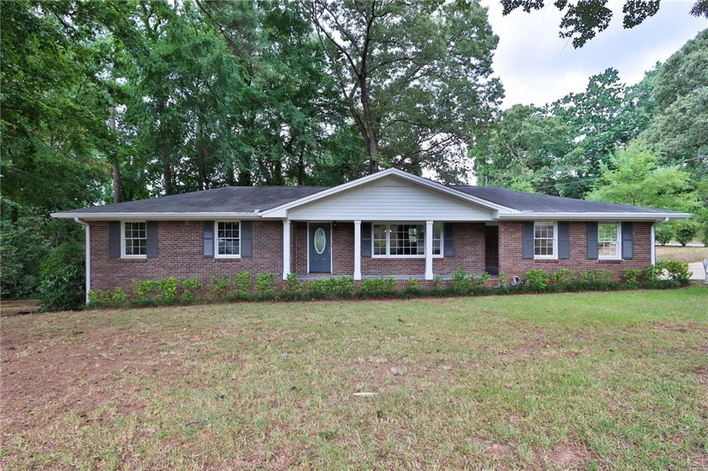 a front of a house with a yard