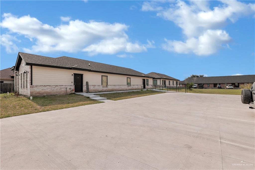 Single story home featuring a front yard