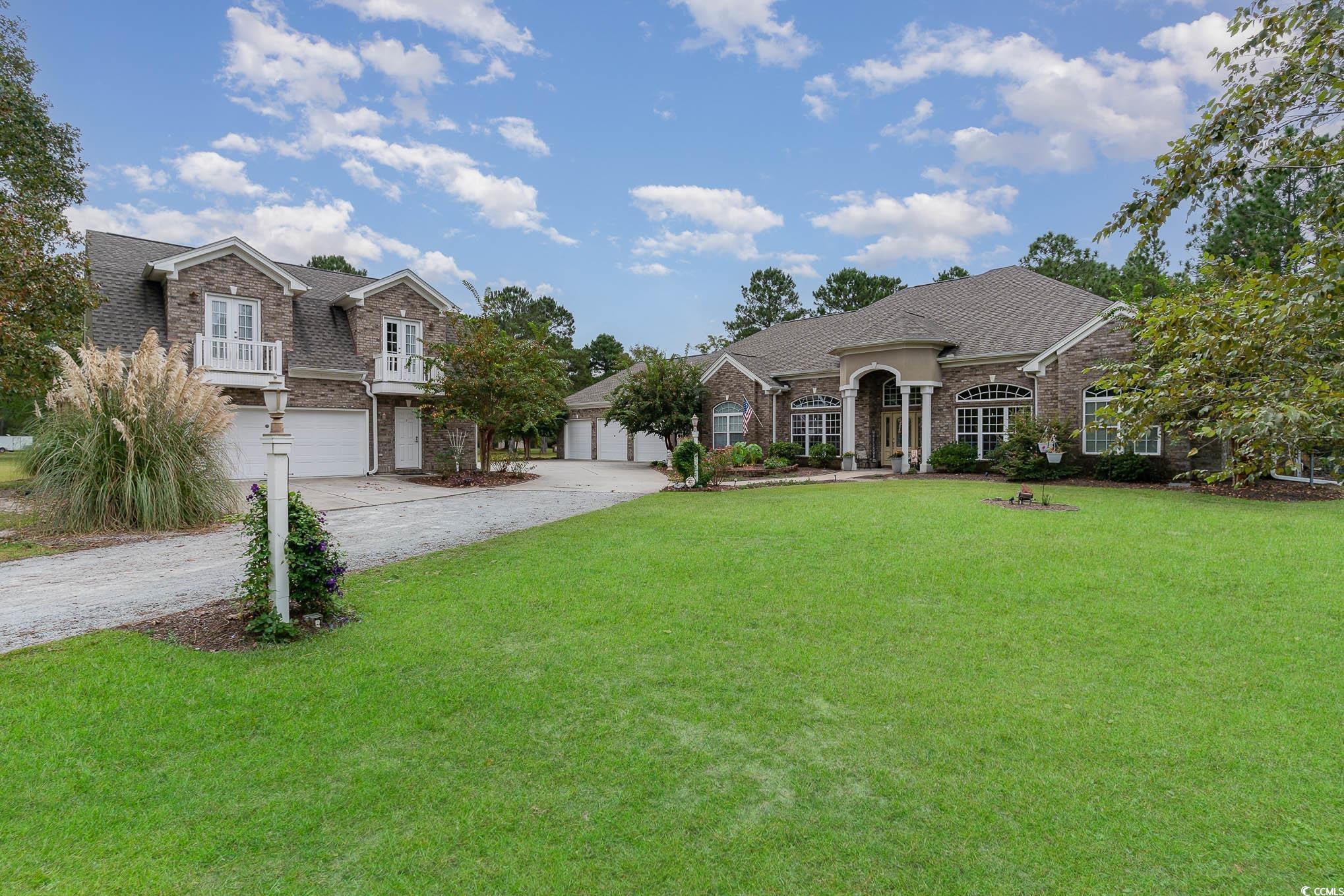 View of front of house with a front yard