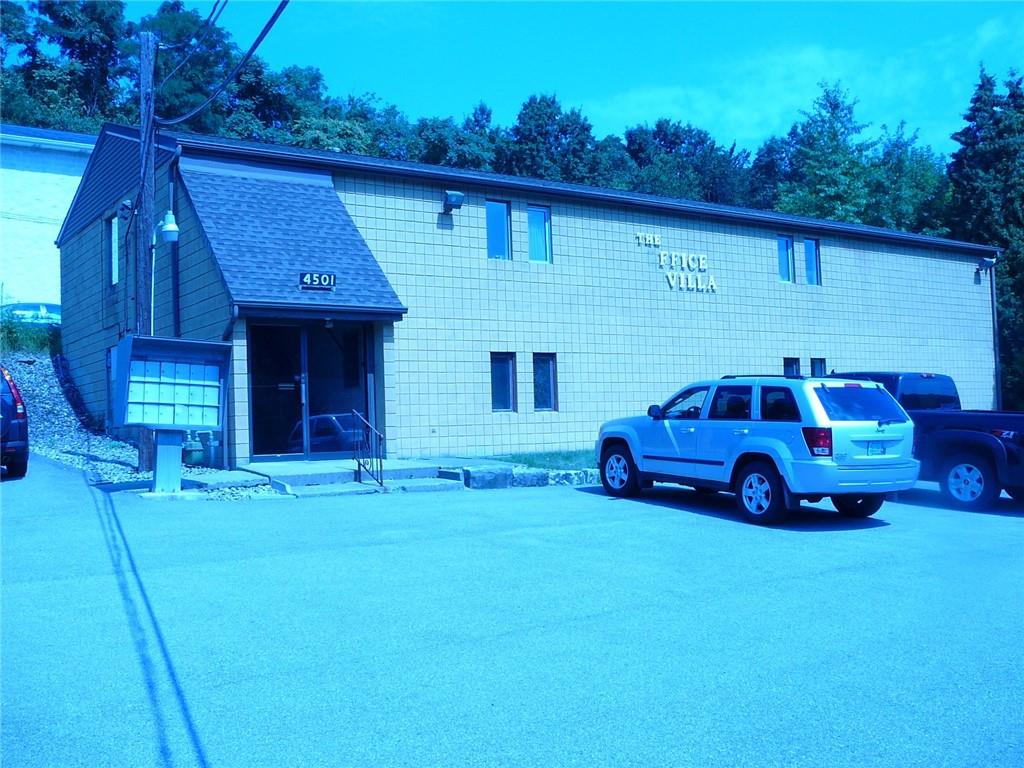 a view of a car in front of house