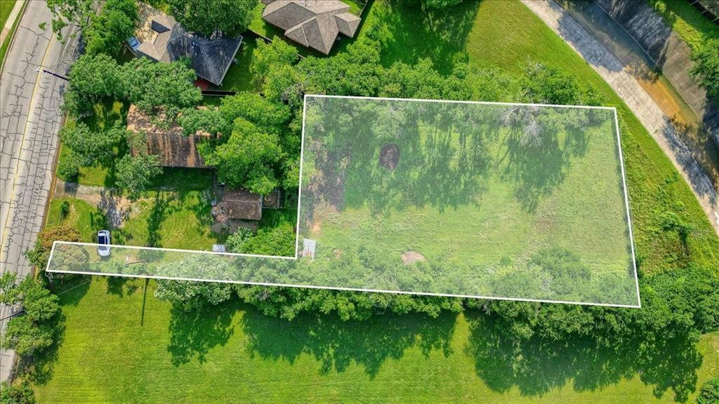 a view of a garden from a balcony