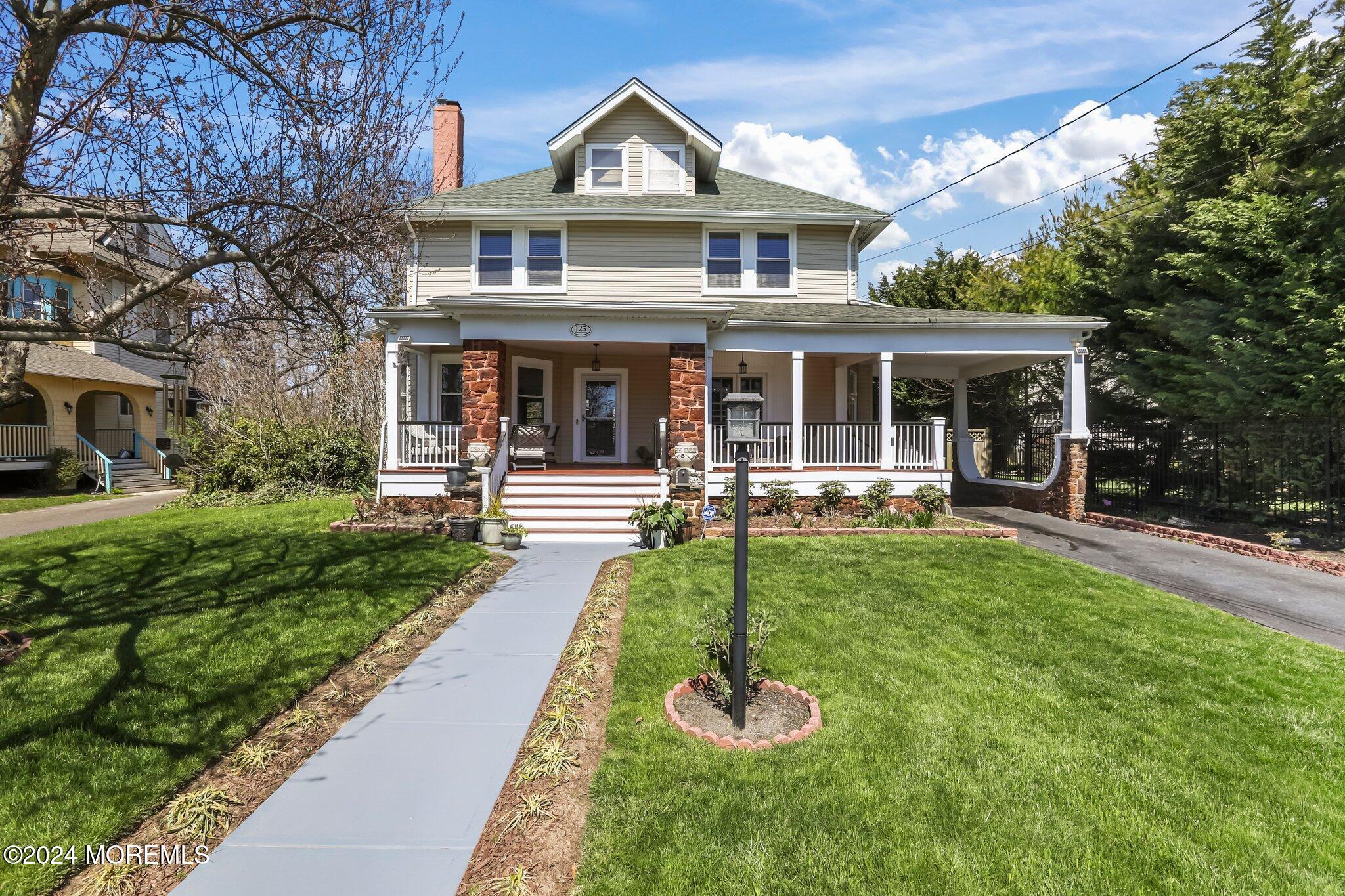 a front view of a house with yard