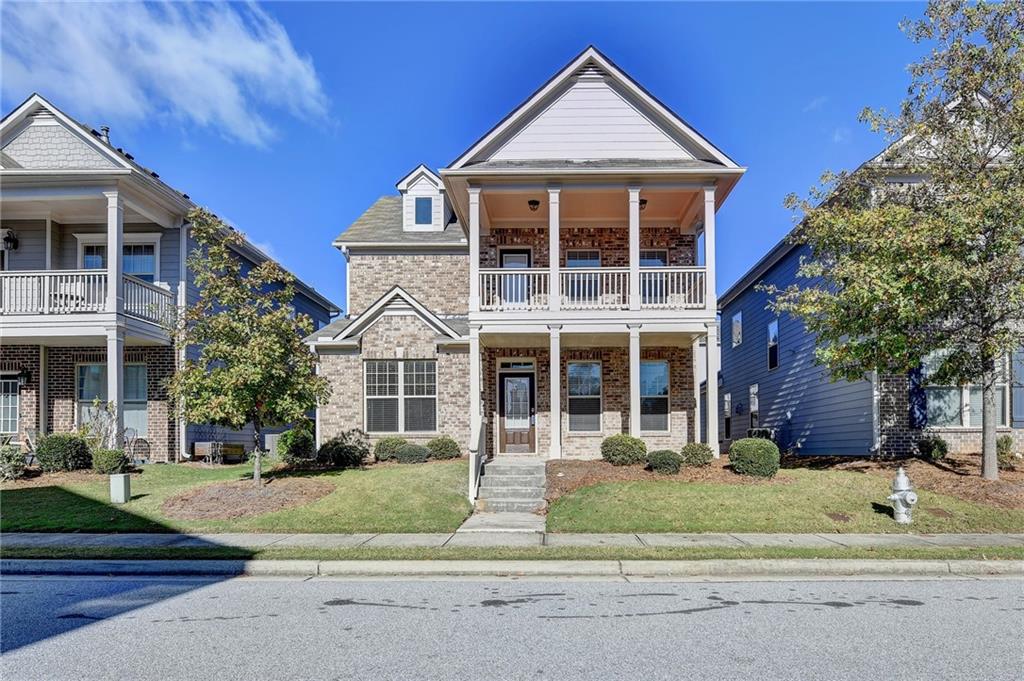 front view of a house with a yard