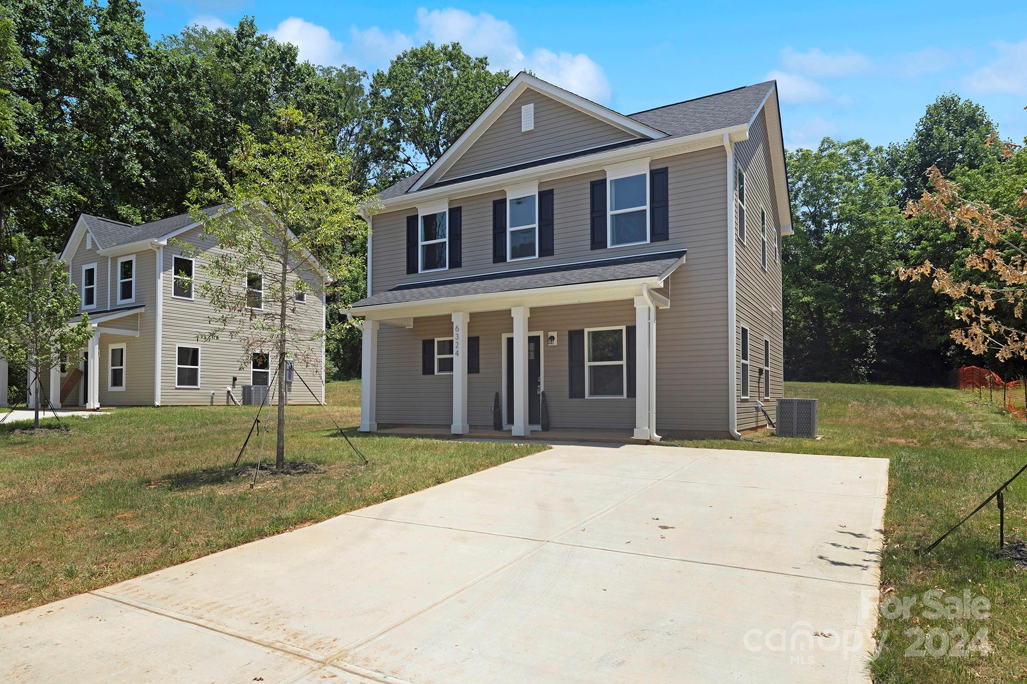 front view of house with a yard