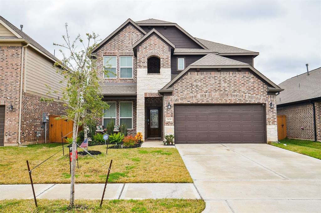 a front view of a house with entertaining space