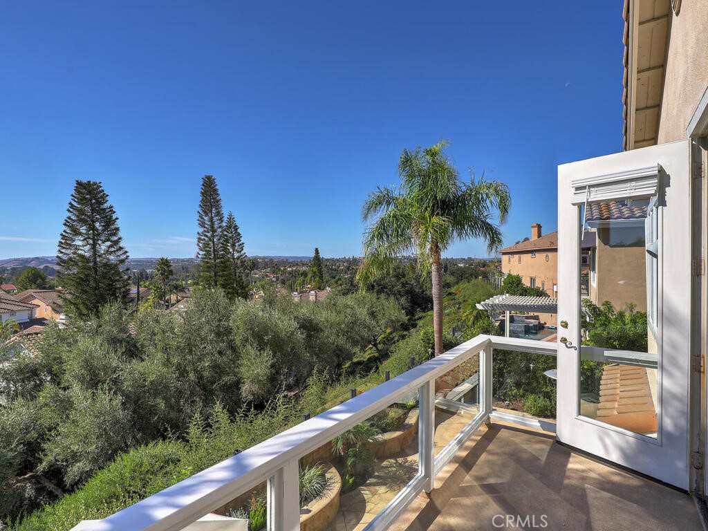 a view of a balcony with an outdoor space