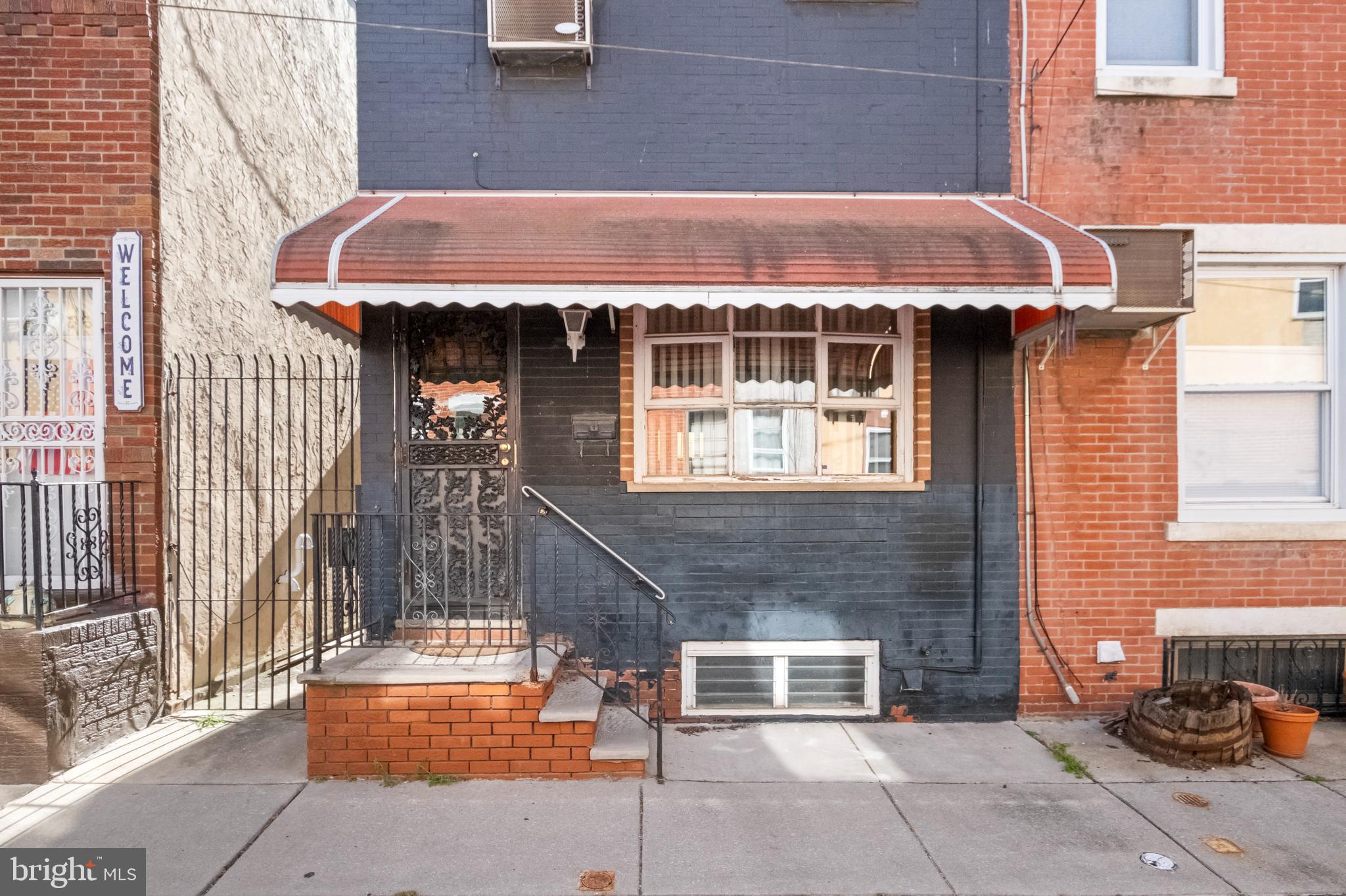 a front view of a house with a garage