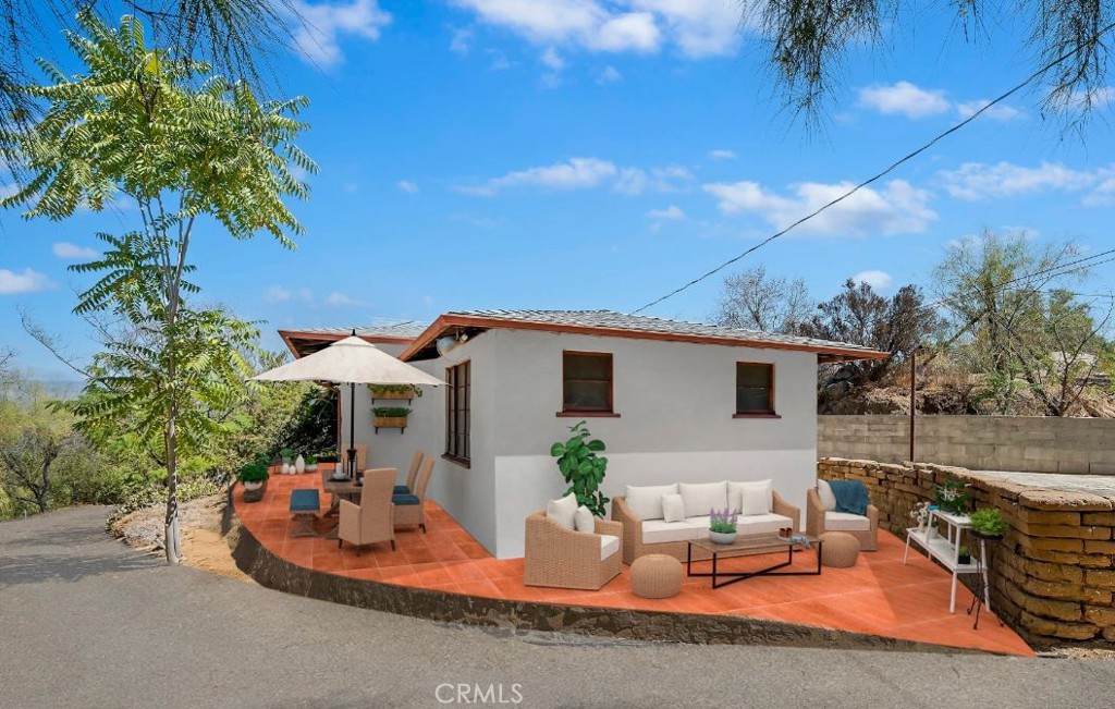 Spanish Adobe Home with Pool virtually enhanced.