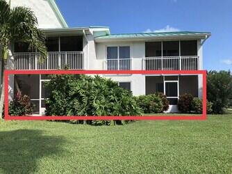 a view of an house with backyard space and garden