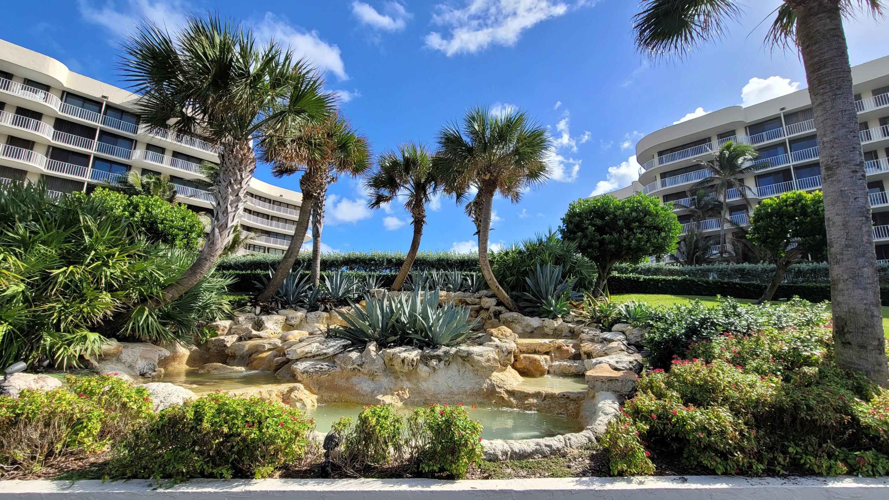 a view of an outdoor space with swimming pool