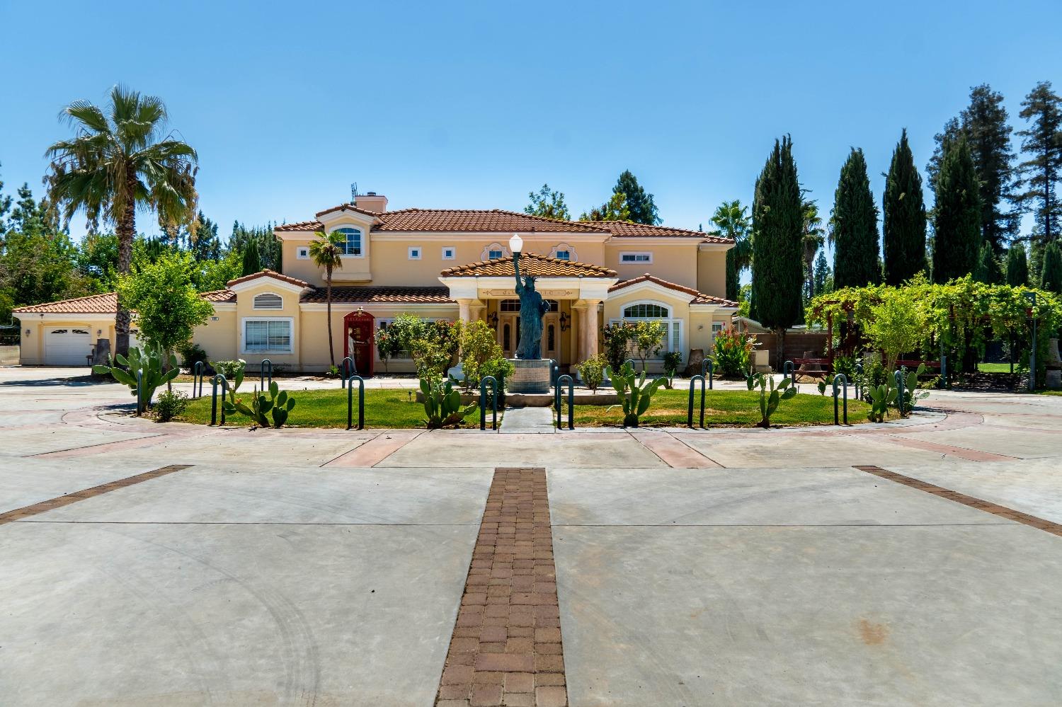 a view of a park with potted plants