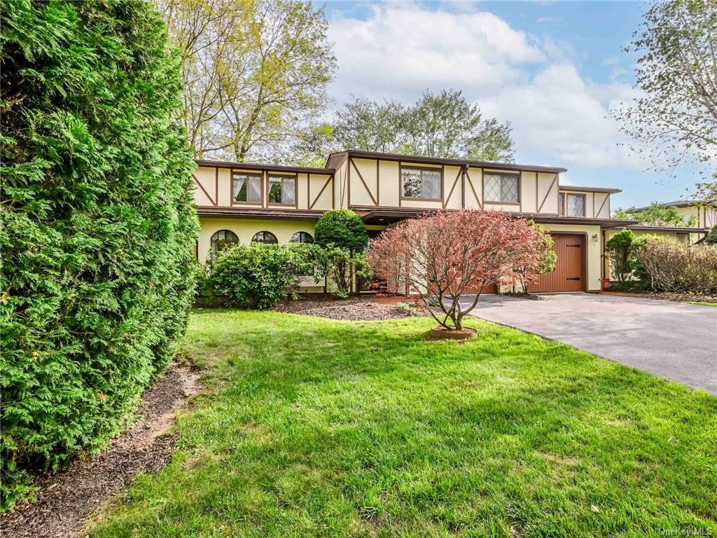 a house view with garden space