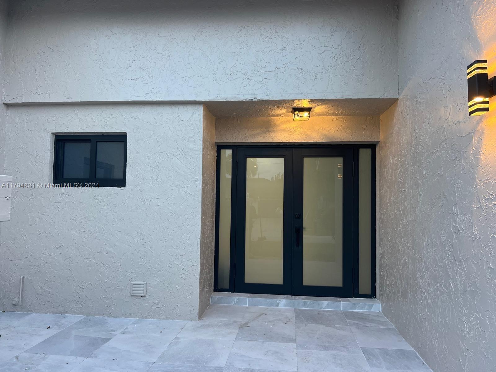 a view of entryway with a hallway