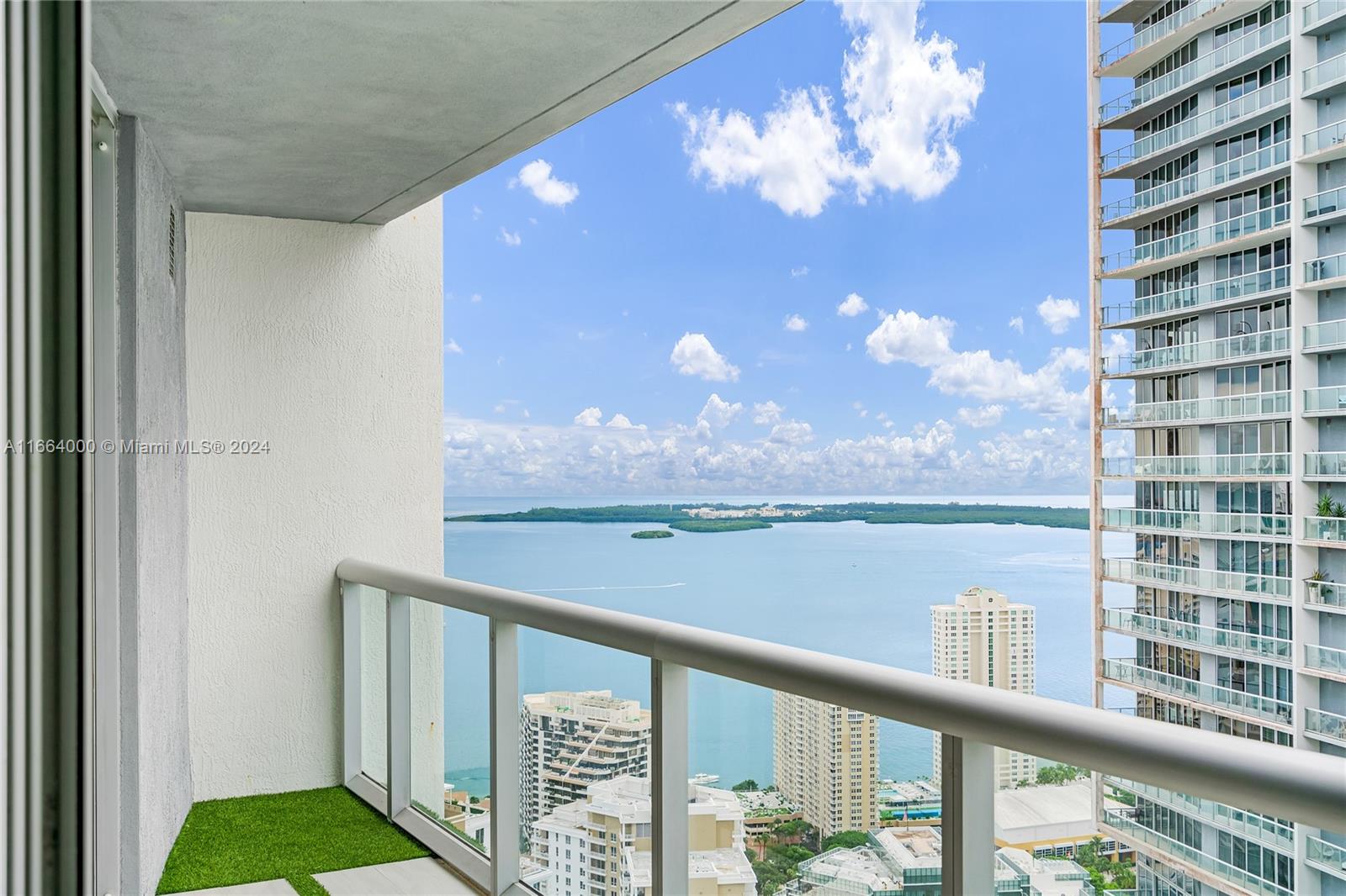 a view of balcony with furniture