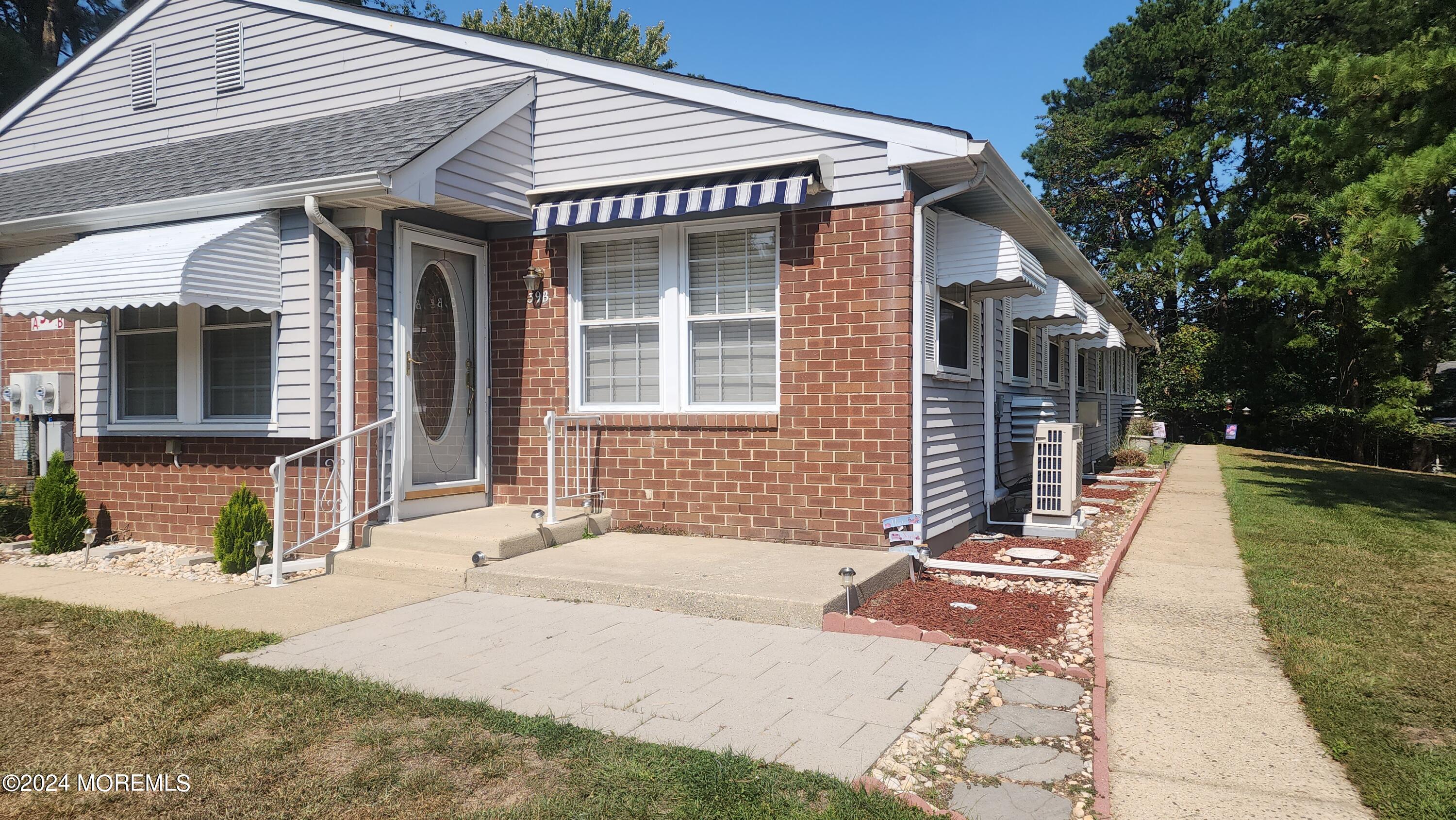 a view of house with outdoor space