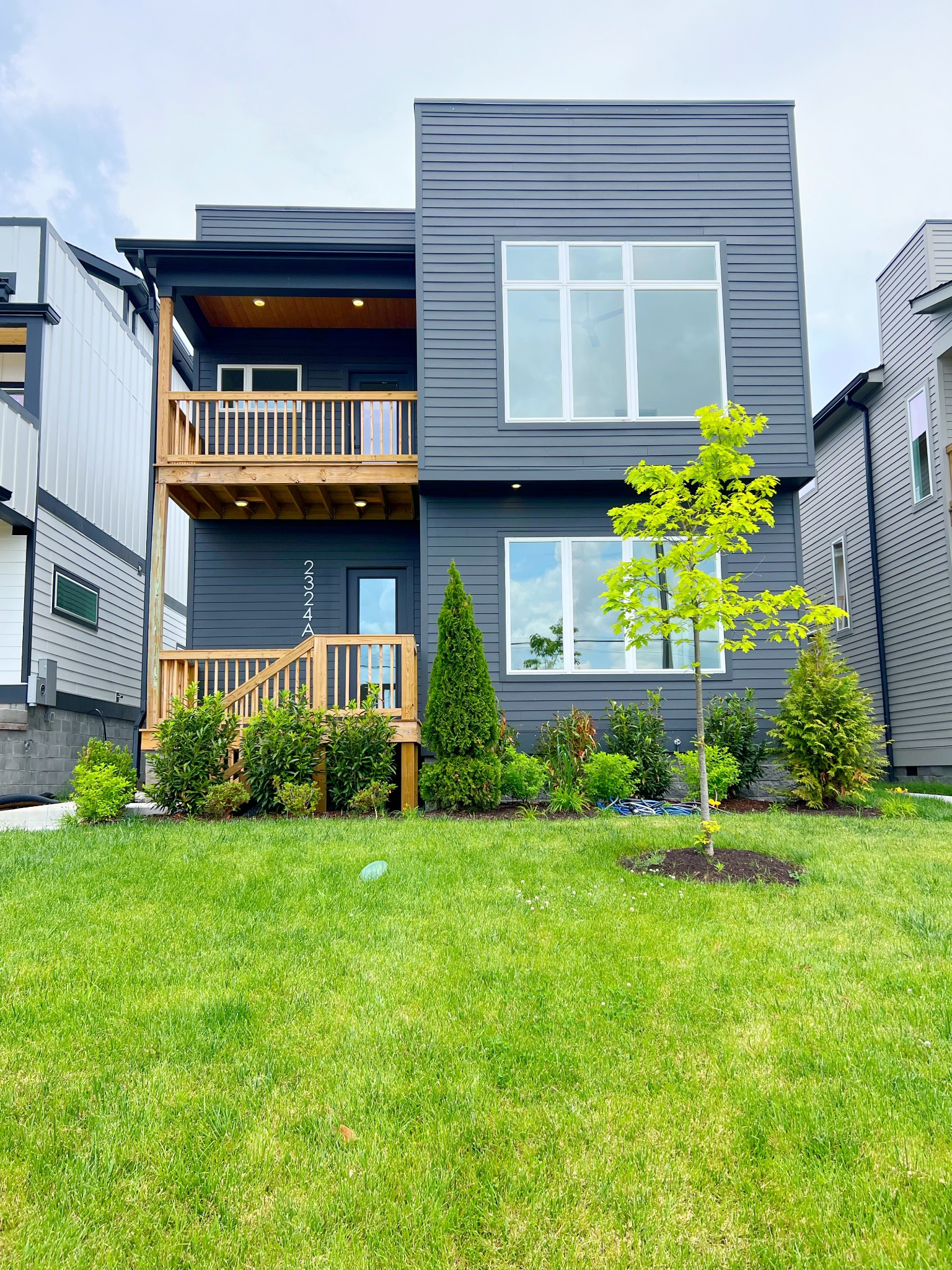 a house view with a garden space