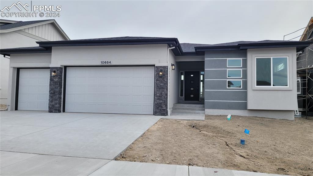 Somerton II-Ranch Plan-Prairie Elevation-3 Car Garage-Finished Walk Out Basement with 9' Ceilings-Desirable Highline at Wolf Ranch Community!