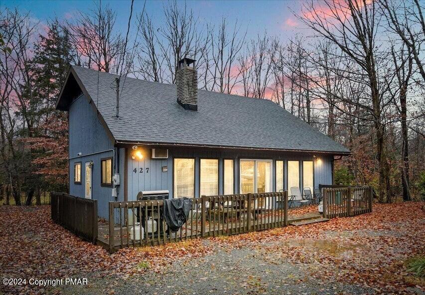 a view of house with a outdoor space