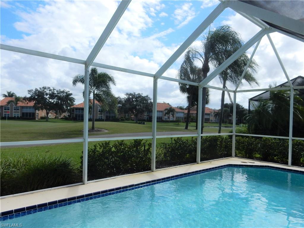 a view of a garden with a swimming pool